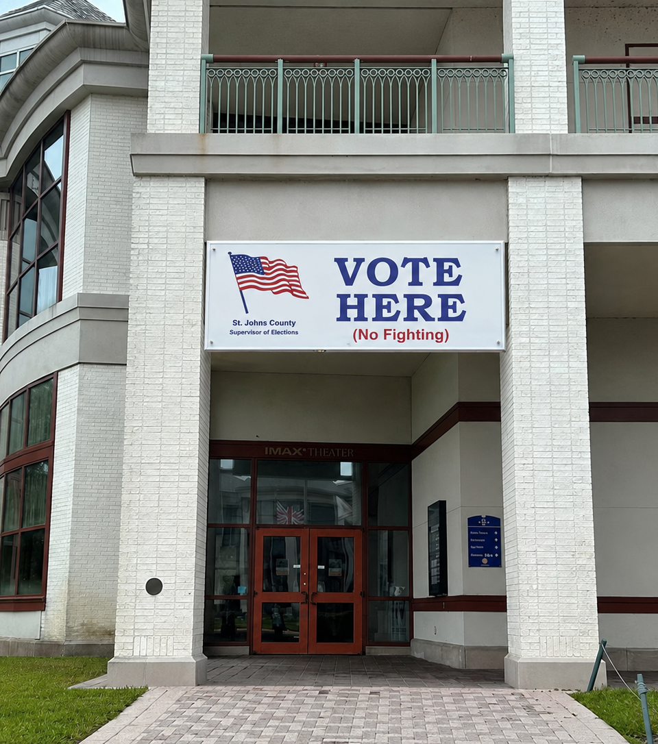 Satirical image of the World Golf Village polling location with a large “VOTE HERE (No Fighting)” sign above the entrance.